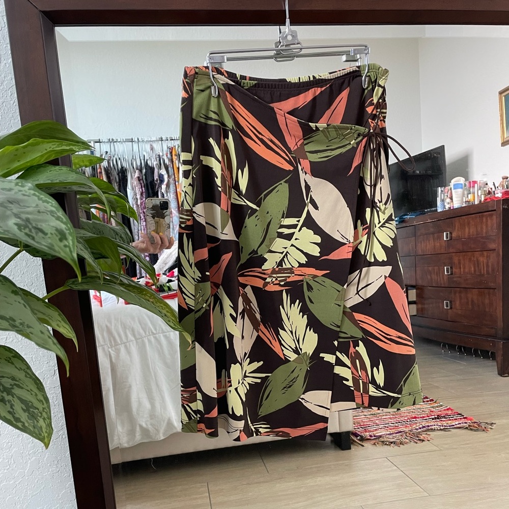 BCBG floral, front wrap skirt. Lightweight and a great fit.